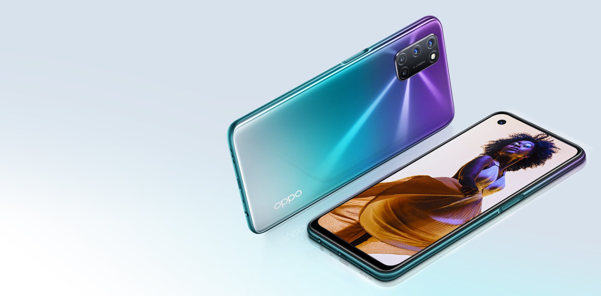 Oppo A72 laying on it's side as well as another Oppo A2 face up