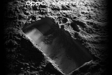 Black and white picture of a phone shaped indent on what is meant to be the moon with OPPO and Hasselblad branding in white text above the image