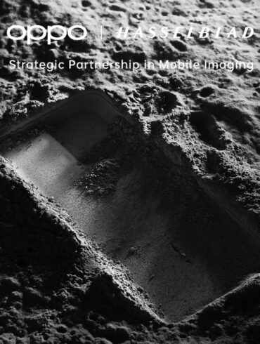 Black and white picture of a phone shaped indent on what is meant to be the moon with OPPO and Hasselblad branding in white text above the image