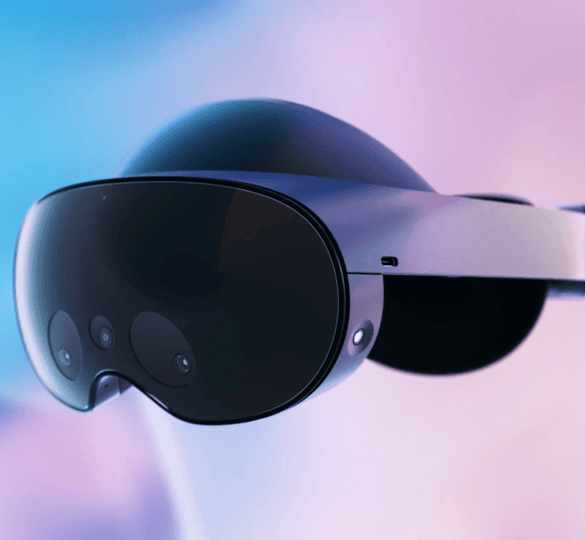 A gif of the Meta Quest Pro virtual reality headset against a colourful background