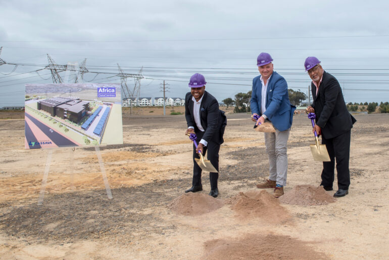 Image of three men holding shovels at the groundbreaking of the new Africa Data Centres location in Cape Town