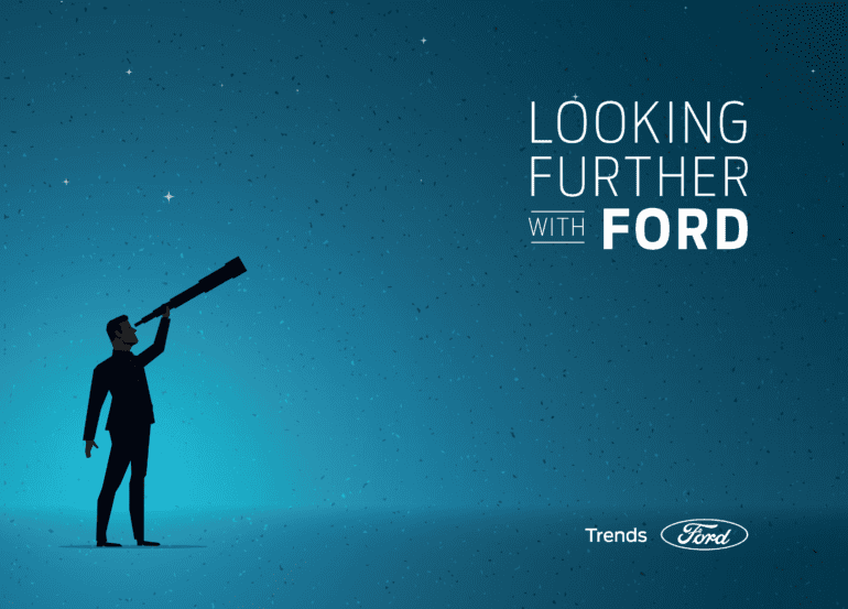 Image of a man holding a looking glass to echo the looking further with Ford tag line