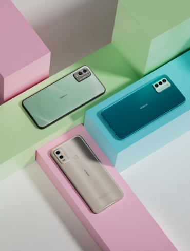 Three new Nokia phones announced at MWC 2023, the Nokia G22, Nokia C32 and Nokia C22, positioned on colourful blocks