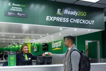 Image of a man getting his keys from Eurpcar car rental assistant as part of the Ready2GO service now available to Discovery Bank clients.
